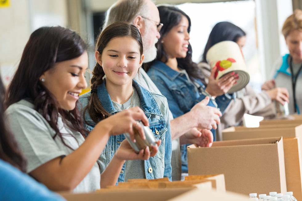 girls filling donation boxes